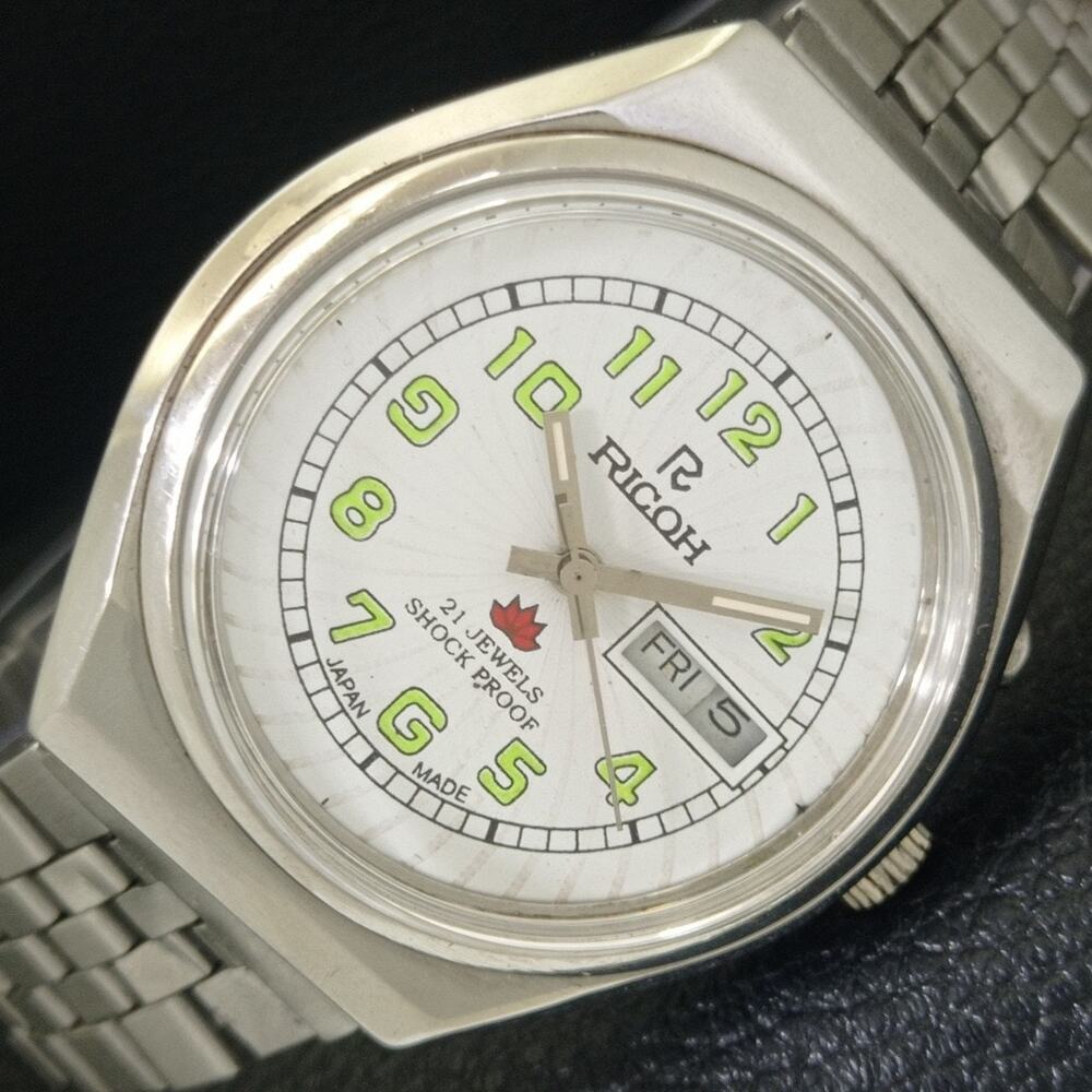 Vintage 1988 Ricoh Automatic Mens Silver Watch W/daydate & Green accents